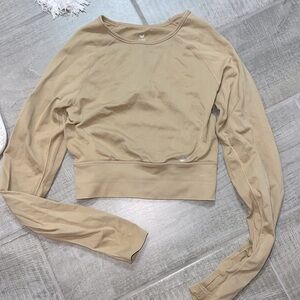Aura Athlectica cropped tan workout top